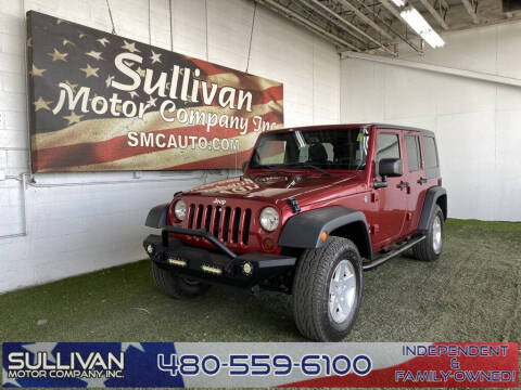 2013 Jeep Wrangler Unlimited for sale at SULLIVAN MOTOR COMPANY INC. in Mesa AZ