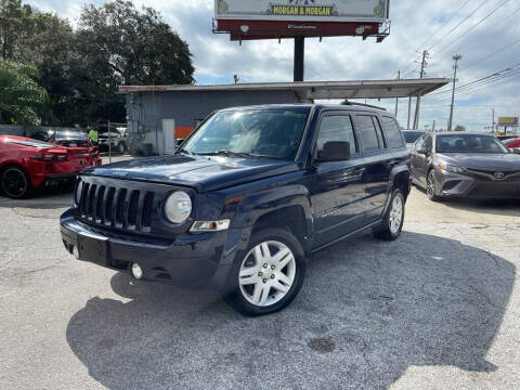 2014 Jeep Patriot for sale at P J Auto Trading Inc in Orlando FL