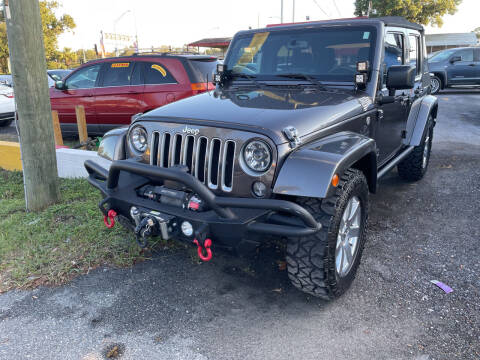 2016 Jeep Wrangler Unlimited for sale at The Peoples Car Company in Jacksonville FL