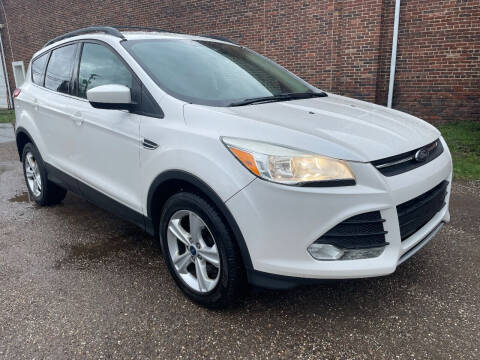 2013 Ford Escape for sale at Jim's Hometown Auto Sales LLC in Byesville OH