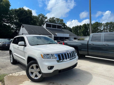 2011 Jeep Grand Cherokee for sale at Alpha Car Land LLC in Snellville GA