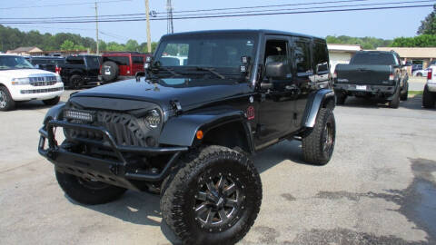 2011 Jeep Wrangler Unlimited for sale at Atlanta Luxury Motors Inc. in Buford GA