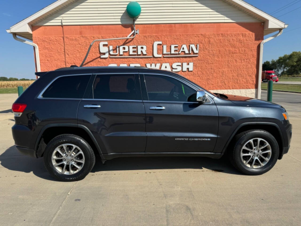 2014 Jeep Grand Cherokee for sale at Illinois Auto Wholesalers in Tolono, IL