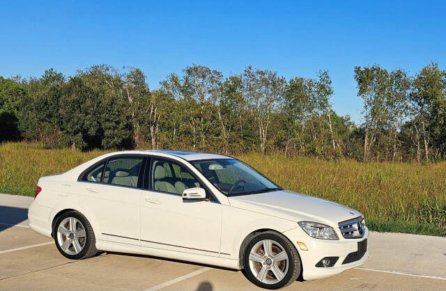 2010 Mercedes-Benz C-Class for sale at CAR MARKET AUTO GROUP in Sugar Land, TX