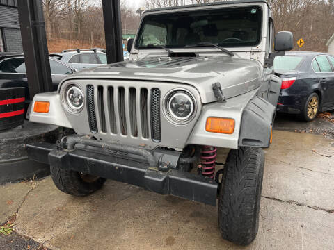 2001 Jeep Wrangler for sale at Apple Auto Sales Inc in Camillus NY