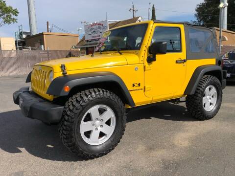 2009 Jeep Wrangler for sale at C J Auto Sales in Riverbank CA