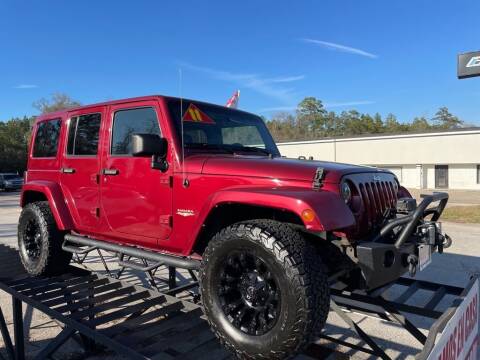 2011 Jeep Wrangler Unlimited for sale at AUTO WOODLANDS in Magnolia TX
