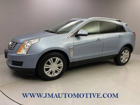 2013 Cadillac SRX for sale at J & M Automotive in Naugatuck CT