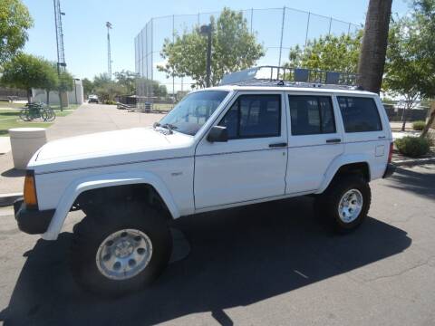 1990 Jeep Cherokee for sale at J & E Auto Sales in Phoenix AZ