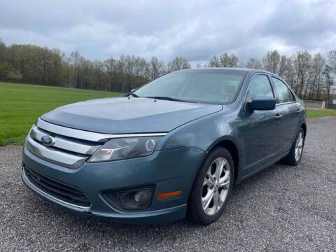 2012 Ford Fusion for sale at GOOD USED CARS INC in Ravenna OH