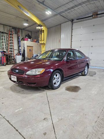 2006 Ford Taurus for sale at WESTSIDE GARAGE LLC in Keokuk IA