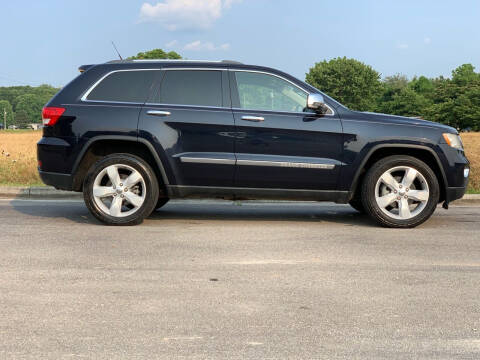 2011 Jeep Grand Cherokee for sale at Tennessee Valley Wholesale Autos LLC in Huntsville AL