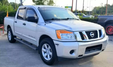 2013 Nissan Titan for sale at CE Auto Sales in Baytown TX
