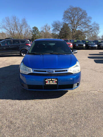 2010 Ford Focus for sale at Autocom, LLC in Clayton NC