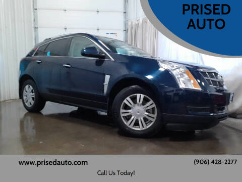 2011 Cadillac SRX for sale at PRISED AUTO in Gladstone MI