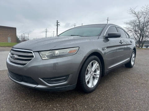 2014 Ford Taurus for sale at Minnix Auto Sales LLC in Cuyahoga Falls OH