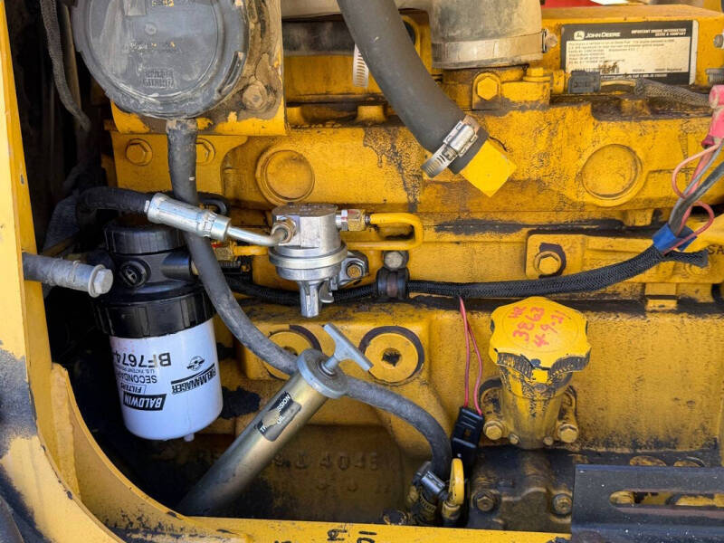 2006 John Deere 210LE