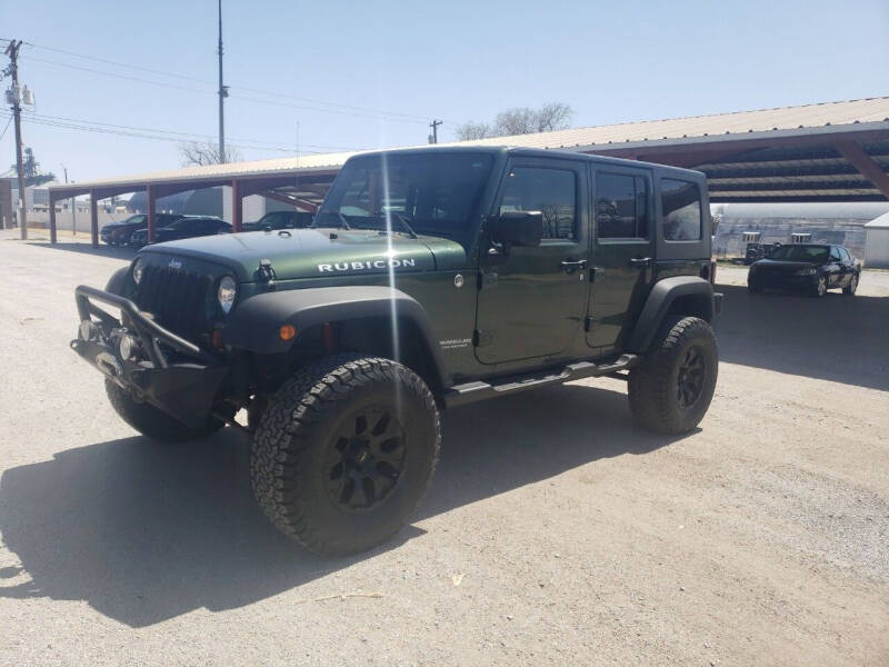 Used 2009 Jeep Wrangler Unlimited Rubicon with VIN 1J4GA69179L711209 for sale in Cambridge, NE