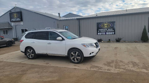 2014 Nissan Pathfinder for sale at BERG AUTO MALL & TRUCKING INC in Beresford SD