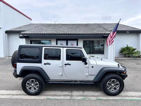 2012 Jeep Wrangler Unlimited for sale at Cars Direct in Ontario CA