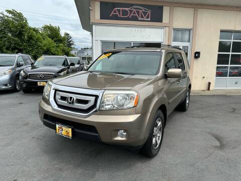 2009 Honda Pilot for sale at ADAM AUTO AGENCY in Rensselaer NY