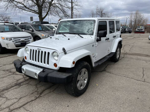 2011 Jeep Wrangler Unlimited for sale at Dean's Auto Sales in Flint MI