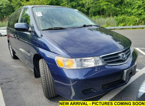 2004 Honda Odyssey for sale at DISTINCT AUTO GROUP LLC in Kent OH