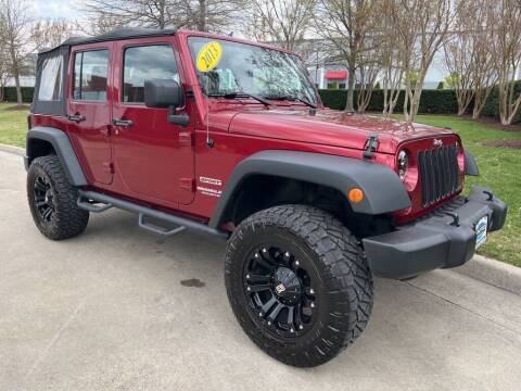 2013 Jeep Wrangler Unlimited for sale at UNITED AUTO WHOLESALERS LLC in Portsmouth VA