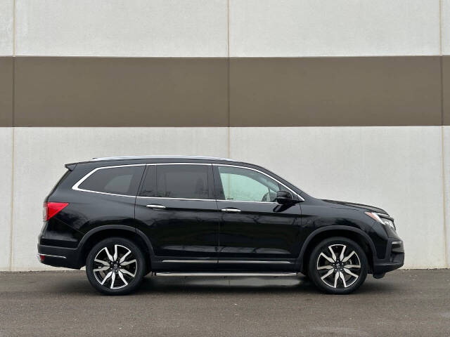 2021 Honda Pilot for sale at Phoenix Motor Co in Romulus, MI