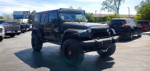 2012 Jeep Wrangler Unlimited for sale at Newcombs North Certified Auto Sales in Metamora MI