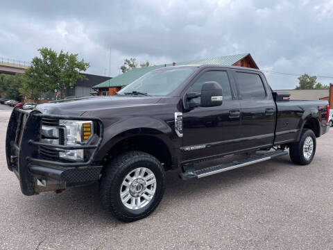 2018 Ford F-250 Super Duty for sale at BERKENKOTTER MOTORS in Brighton CO