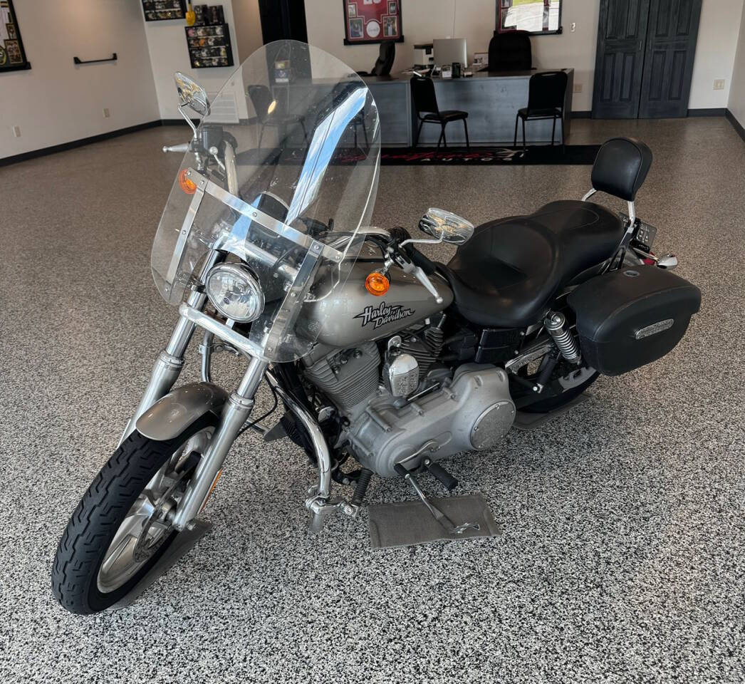 2009 Harley-Davidson Super Glide for sale at SIGNATURE AUTOS LLC in Weston, WI