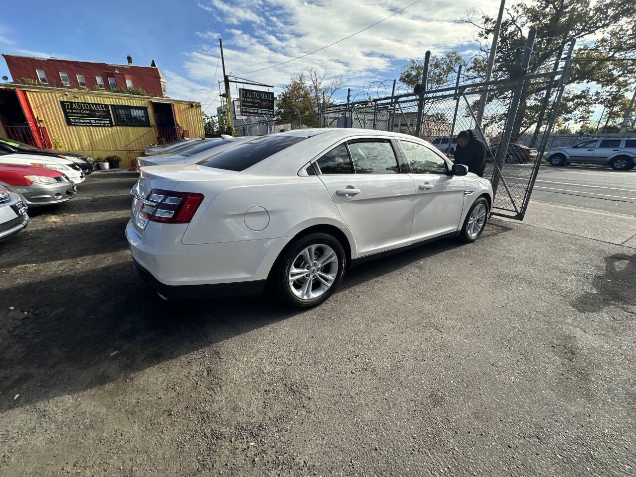 2014 Ford Taurus for sale at 77 Auto Mall in Newark, NJ