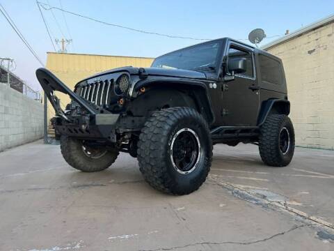 2010 Jeep Wrangler for sale at Classic Car Deals in Cadillac MI
