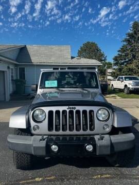 2014 Jeep Wrangler Unlimited for sale at JR Auto in Brookings SD