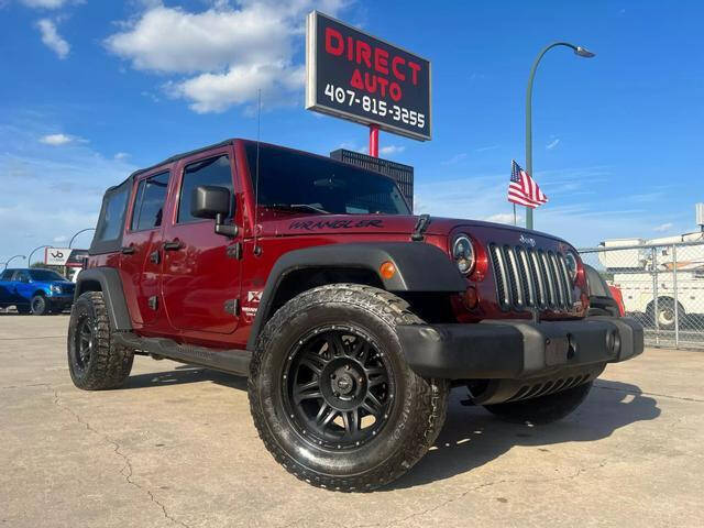 2009 Jeep Wrangler Unlimited for sale at Direct Auto in Orlando FL