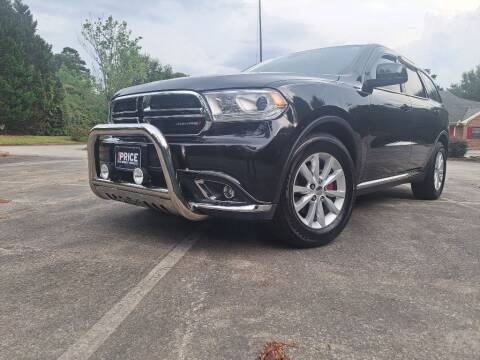 2014 Dodge Durango for sale at Magwood Auto Dealers LLC in Jonesboro GA