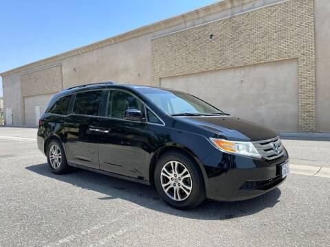 2011 Honda Odyssey for sale at E and M Auto Sales in Bloomington CA