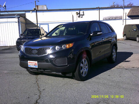 2013 Kia Sorento for sale at MIRACLE AUTO SALES in Cranston RI