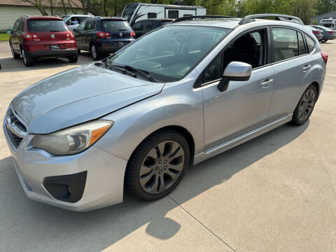 2014 Subaru Impreza for sale at EUROPEAN AUTOHAUS in Holland MI