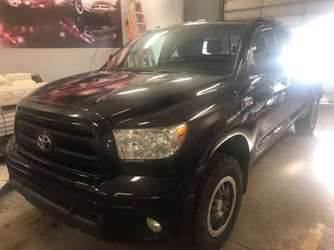 2011 Toyota Tundra for sale at BEACH AUTO GROUP LLC in Bunnell FL