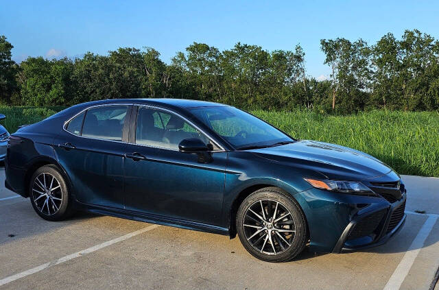 2021 Toyota Camry for sale at CAR MARKET AUTO GROUP in Sugar Land, TX