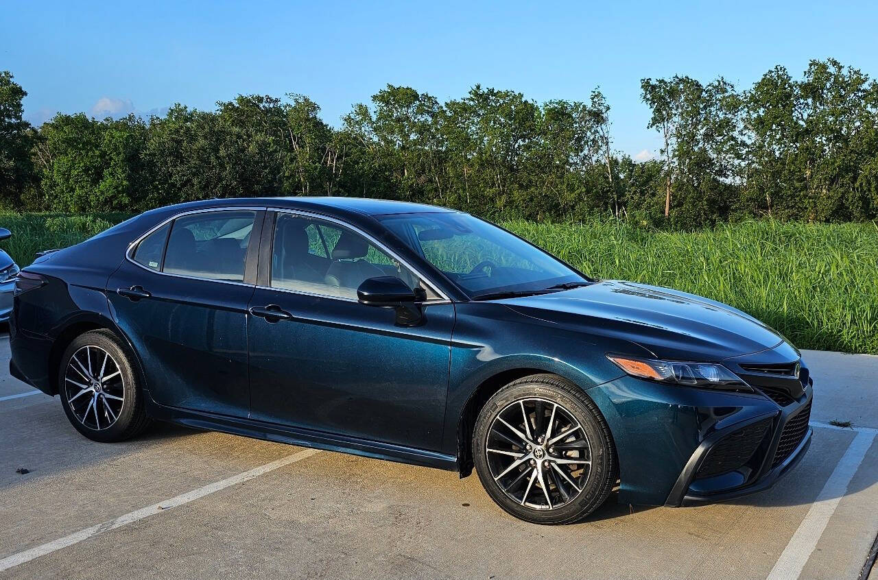 2021 Toyota Camry for sale at CAR MARKET AUTO GROUP in Sugar Land, TX