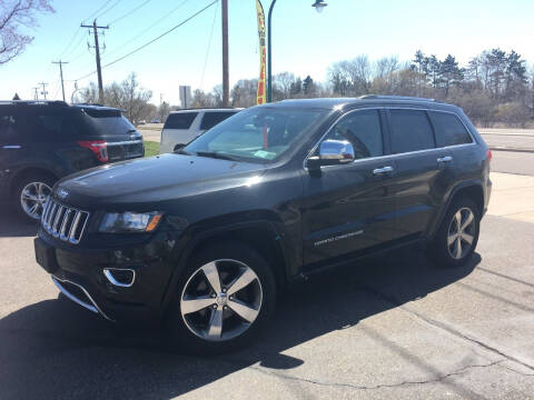 2014 Jeep Grand Cherokee for sale at Premier Motors LLC in Crystal MN