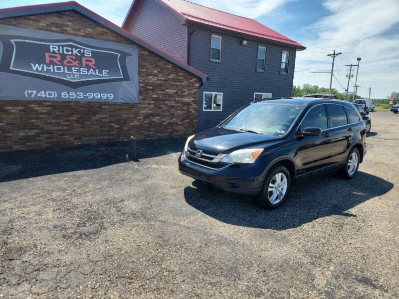 2011 Honda CR-V for sale at Rick's R & R Wholesale, LLC in Lancaster OH