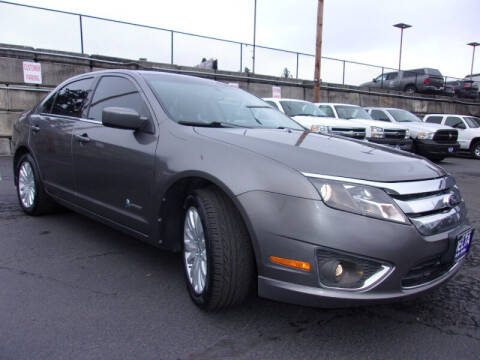 2012 Ford Fusion Hybrid for sale at Delta Auto Sales in Milwaukie OR