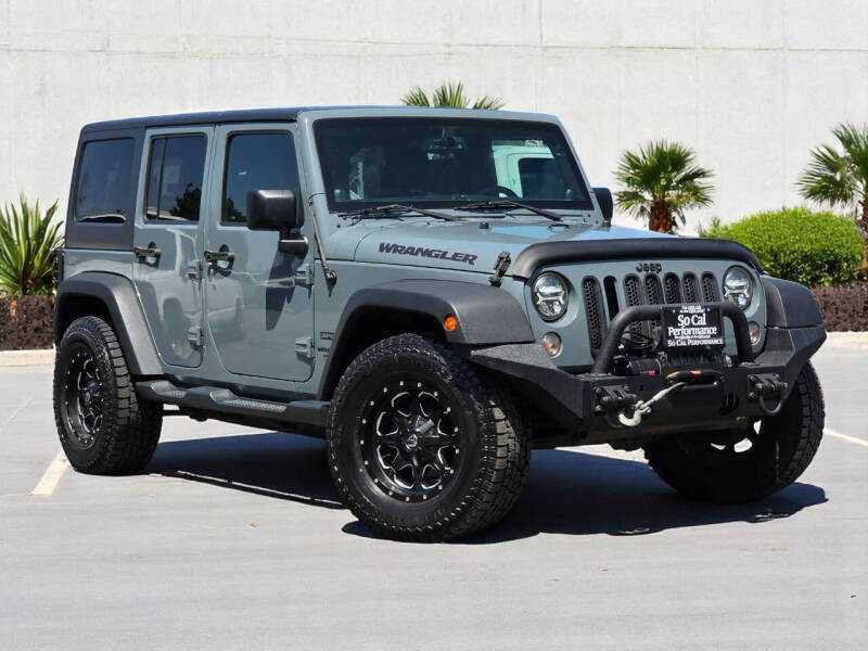 Used 2014 Jeep Wrangler Unlimited Sport with VIN 1C4BJWDG8EL317739 for sale in San Diego, CA