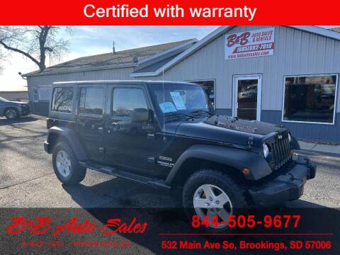 2011 Jeep Wrangler Unlimited for sale at B & B Auto Sales in Brookings SD