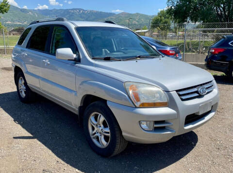 2007 Kia Sportage for sale at The Car-Mart in Bountiful UT