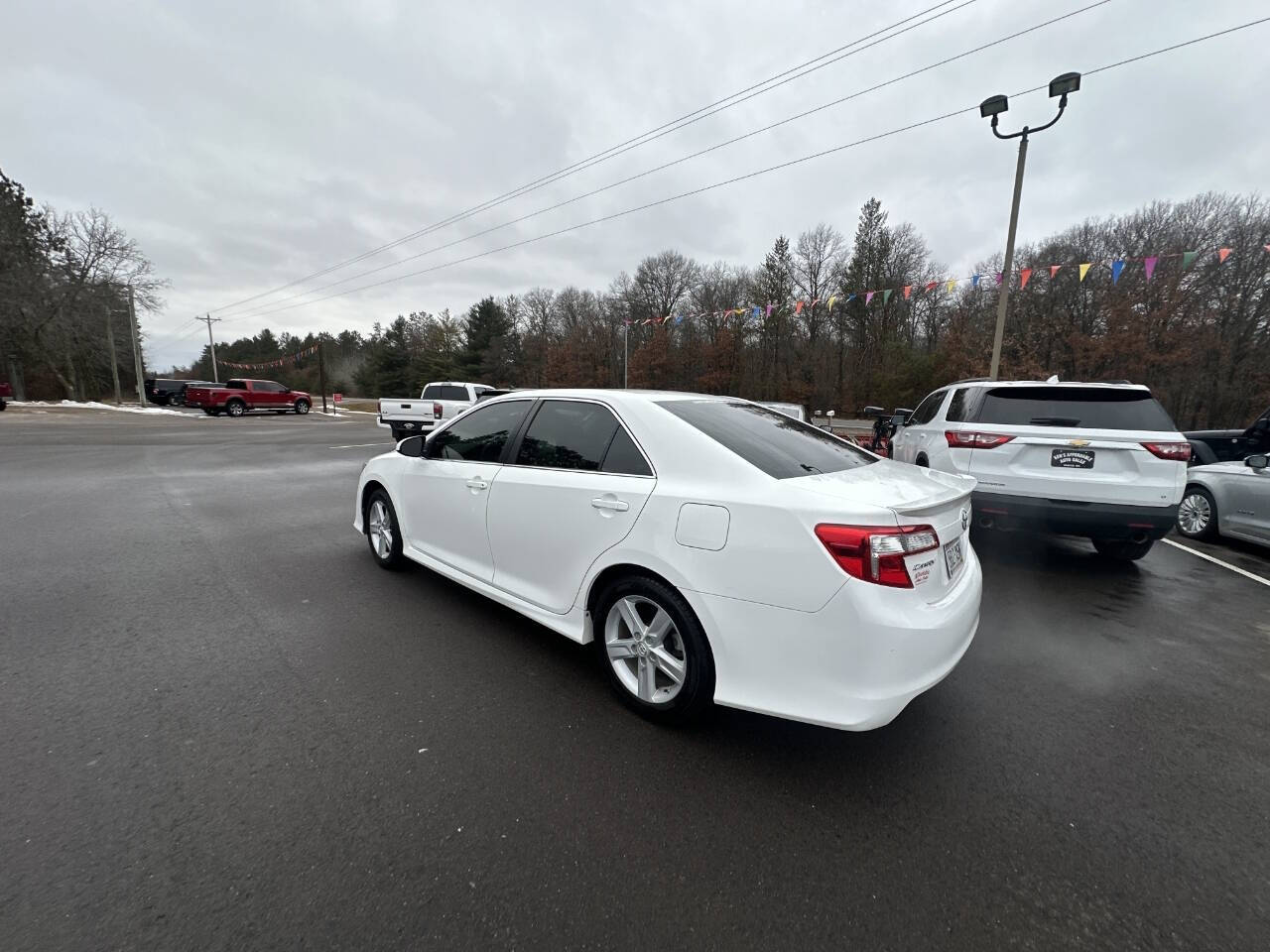 2014 Toyota Camry for sale at Auto Hunter in Webster, WI